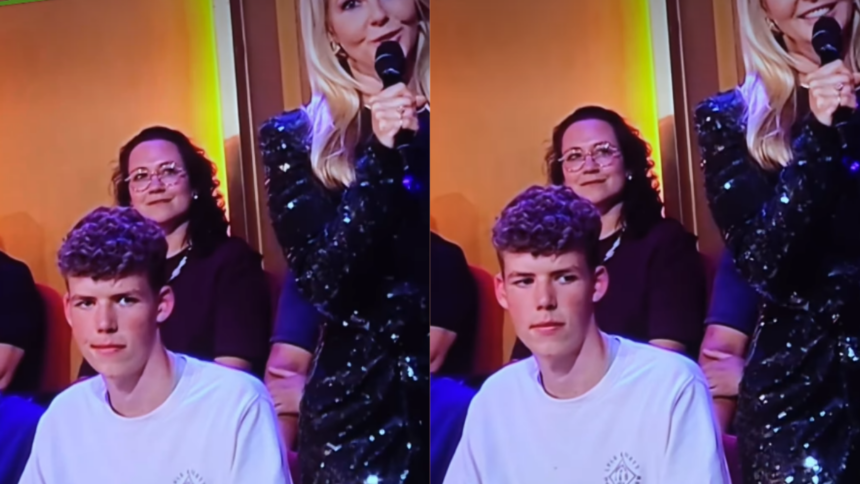 Jongen in publiek die uit alle macht probeert NIET naar zitvlak Chantal Janzen te kijken faalt hopeloos